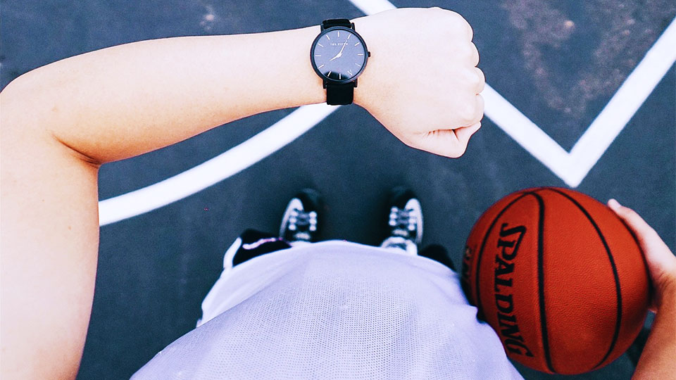 watch on the arm of a basketball player