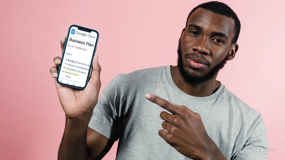 man showing a smartphone with google docs