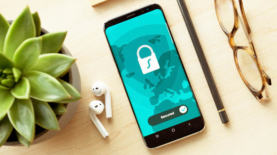 a phone on the table with vpn app