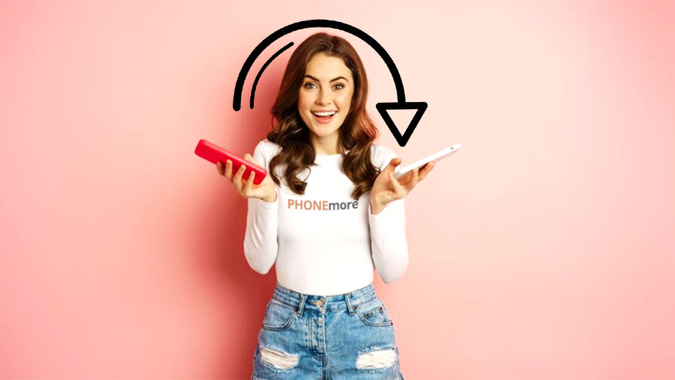 woman holding two smartphones